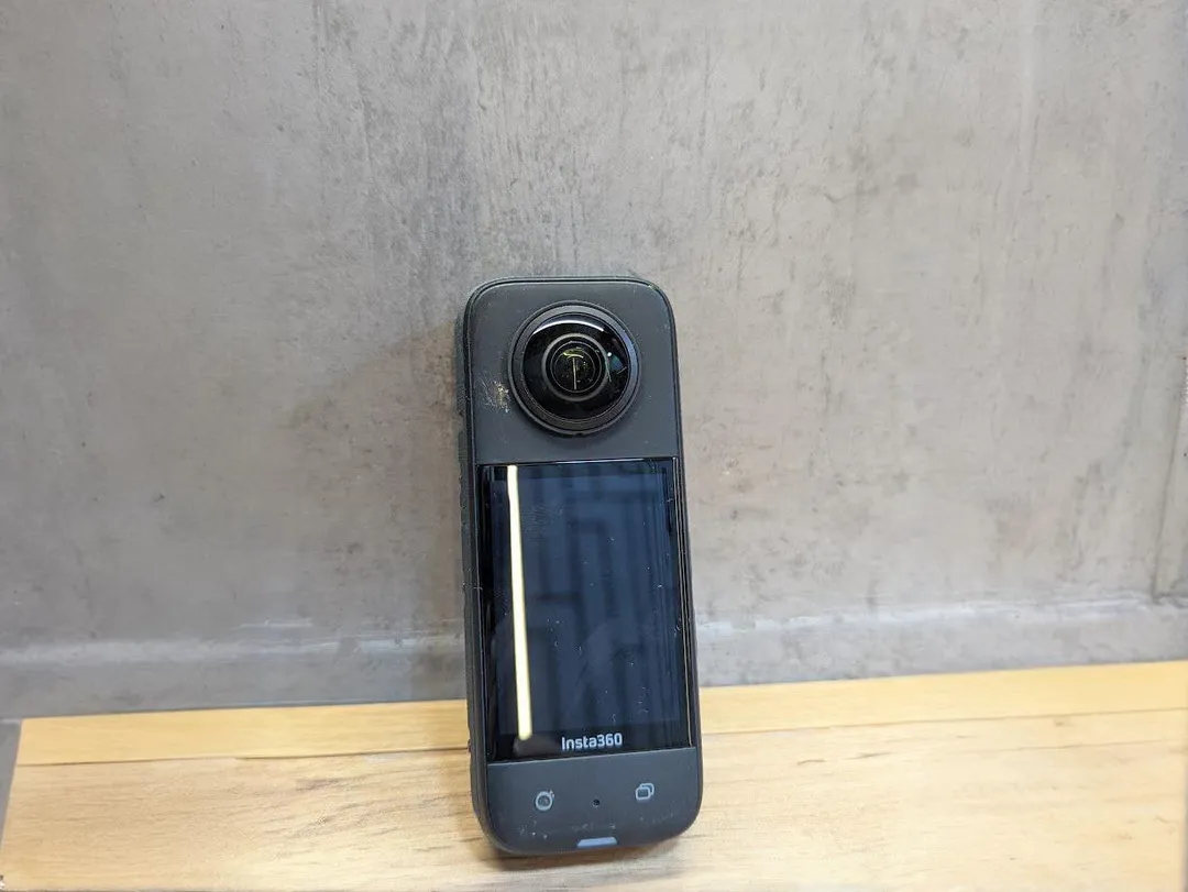 Insta360 camera with a line across its screen