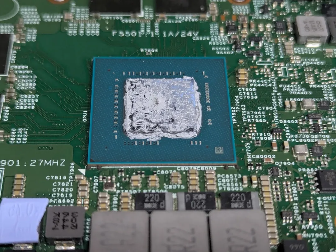 Laptop graphics chip with liquid metal applied, on the motherboard
